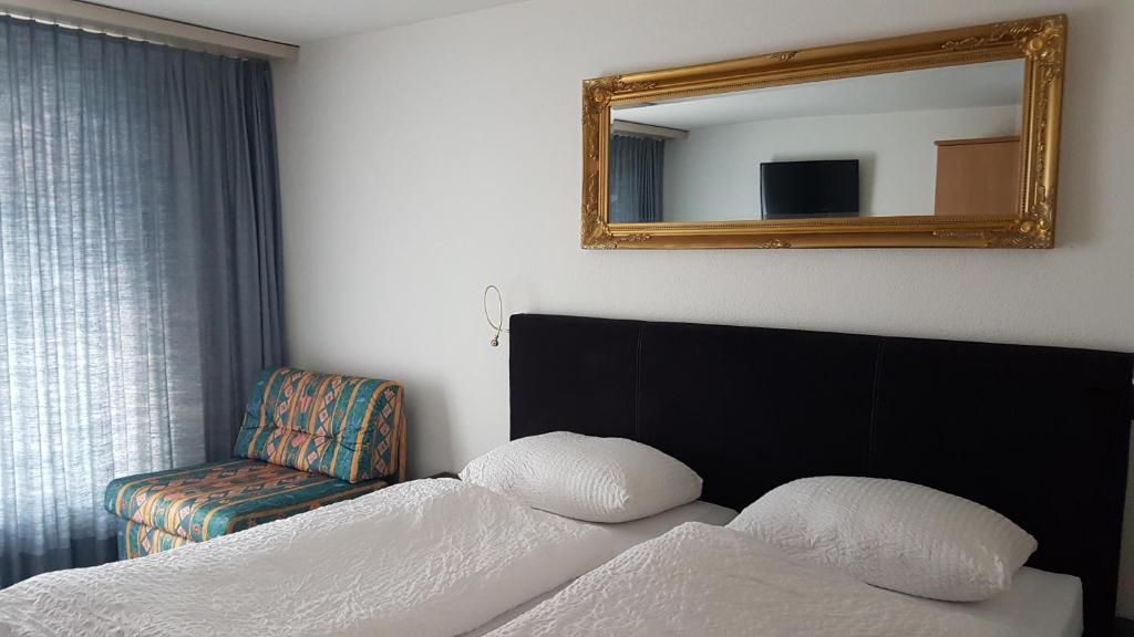 Postel nebo postele na pokoji v ubytování Hotel Crystal