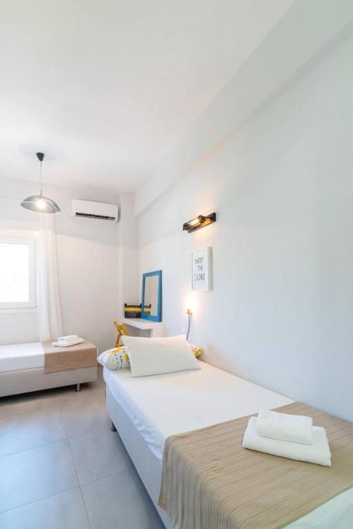 Posteľ alebo postele v izbe v ubytovaní Rodamos apartment