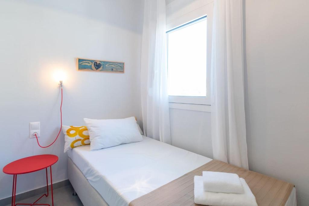 Posteľ alebo postele v izbe v ubytovaní Rodamos apartment