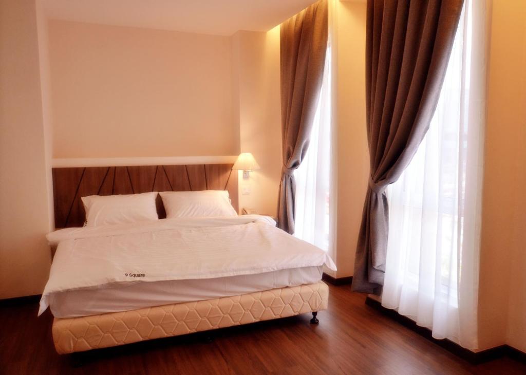 Postel nebo postele na pokoji v ubytování 9 Square Hotel - Petaling Jaya