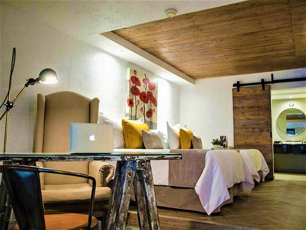 Posezení v ubytování NEhotel Nueva Estancia