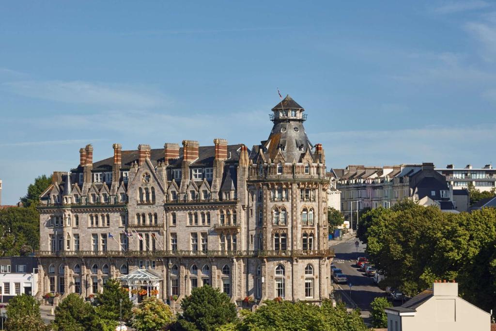 an old building with a tower on top of it at Duke Of Cornwall Hotel in Plymouth