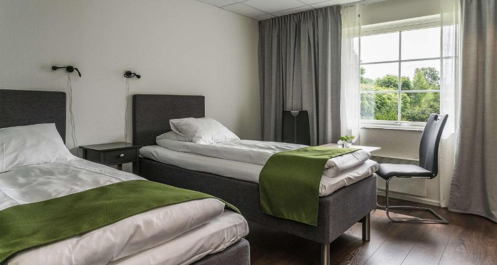 Postel nebo postele na pokoji v ubytování Best Western Hotel Vrigstad