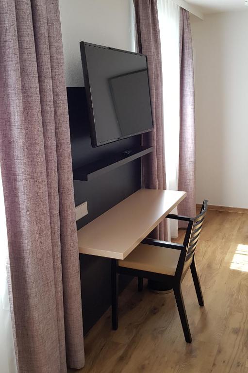 TV a/nebo společenská místnost v ubytování Hotel U7