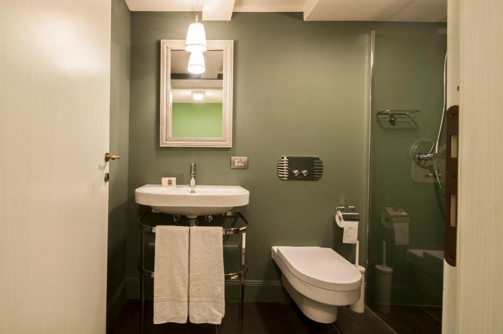 Kúpeľňa v ubytovaní Isola Bella Apartments - Via Villa 9