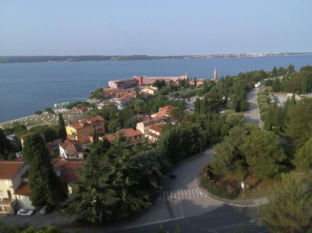 an aerial view of a town next to the water at Apartments Leko in Portorož