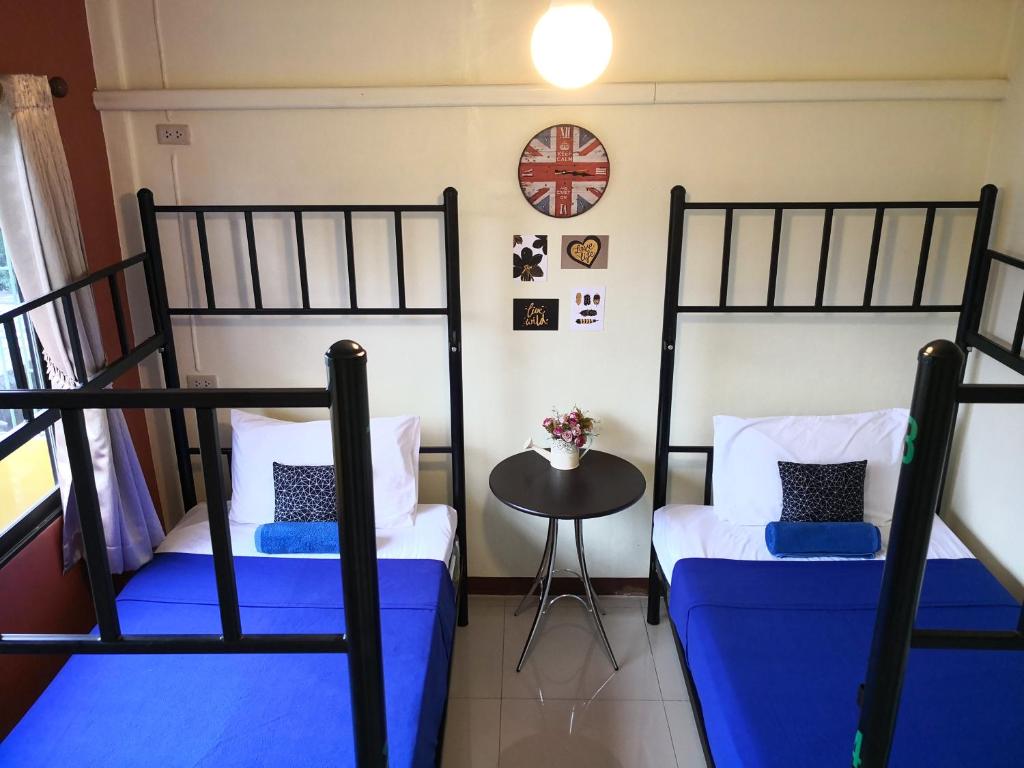 Postel nebo postele na pokoji v ubytování Chan Cha La 99 Hostel