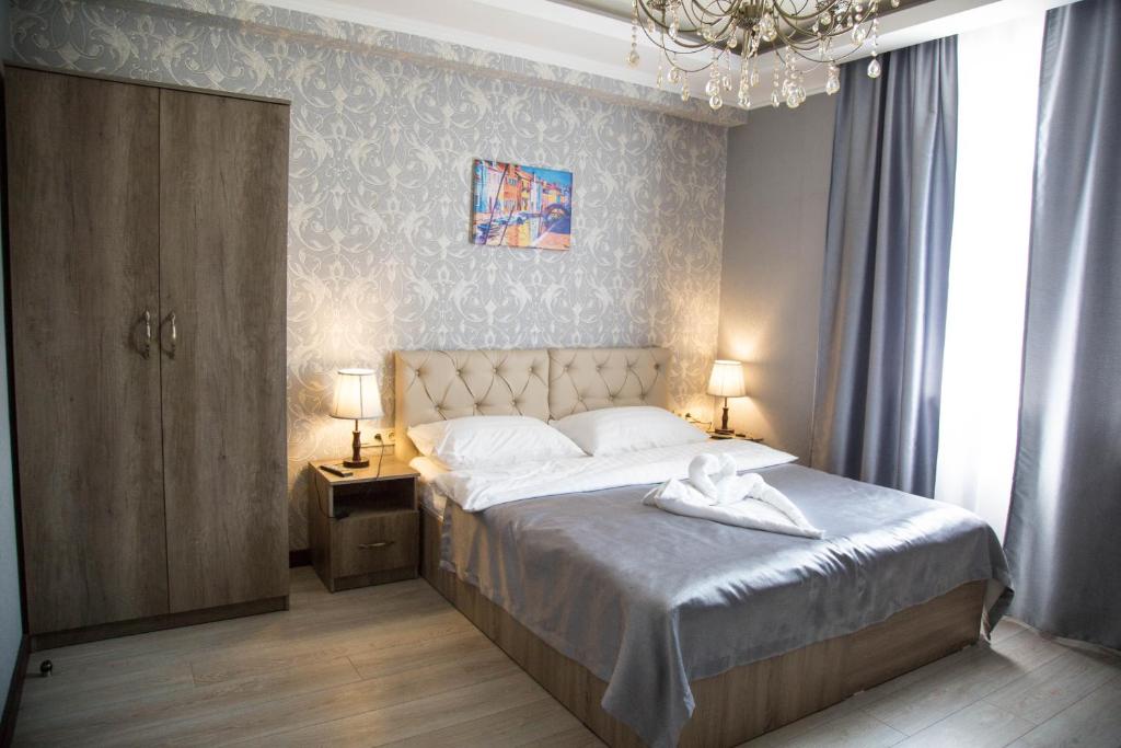 Postel nebo postele na pokoji v ubytování De'Mar Hotel