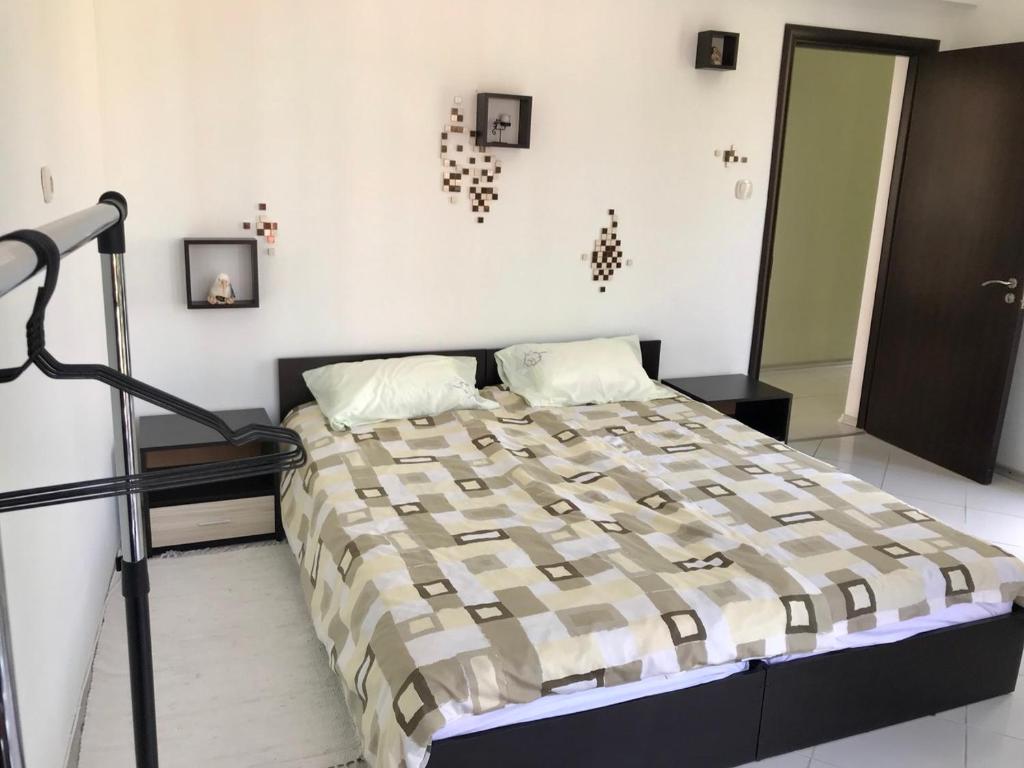 Ένα ή περισσότερα κρεβάτια σε δωμάτιο στο Helga Apartment