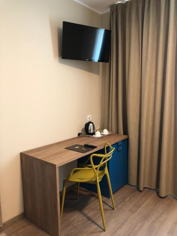 TV a/nebo společenská místnost v ubytování Ark Hotel