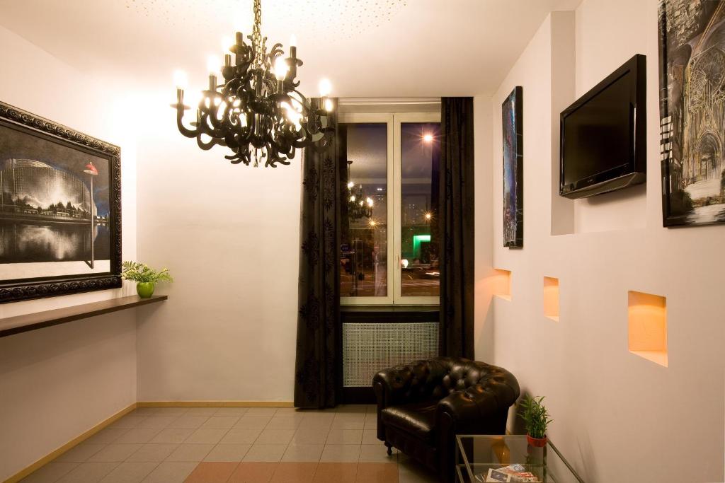 TV a/nebo společenská místnost v ubytování Hotel Esplanade