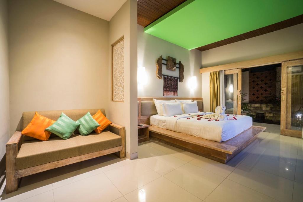Postel nebo postele na pokoji v ubytování Tetirah Boutique Hotel