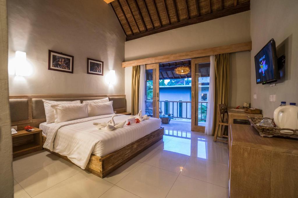 Postel nebo postele na pokoji v ubytování Tetirah Boutique Hotel