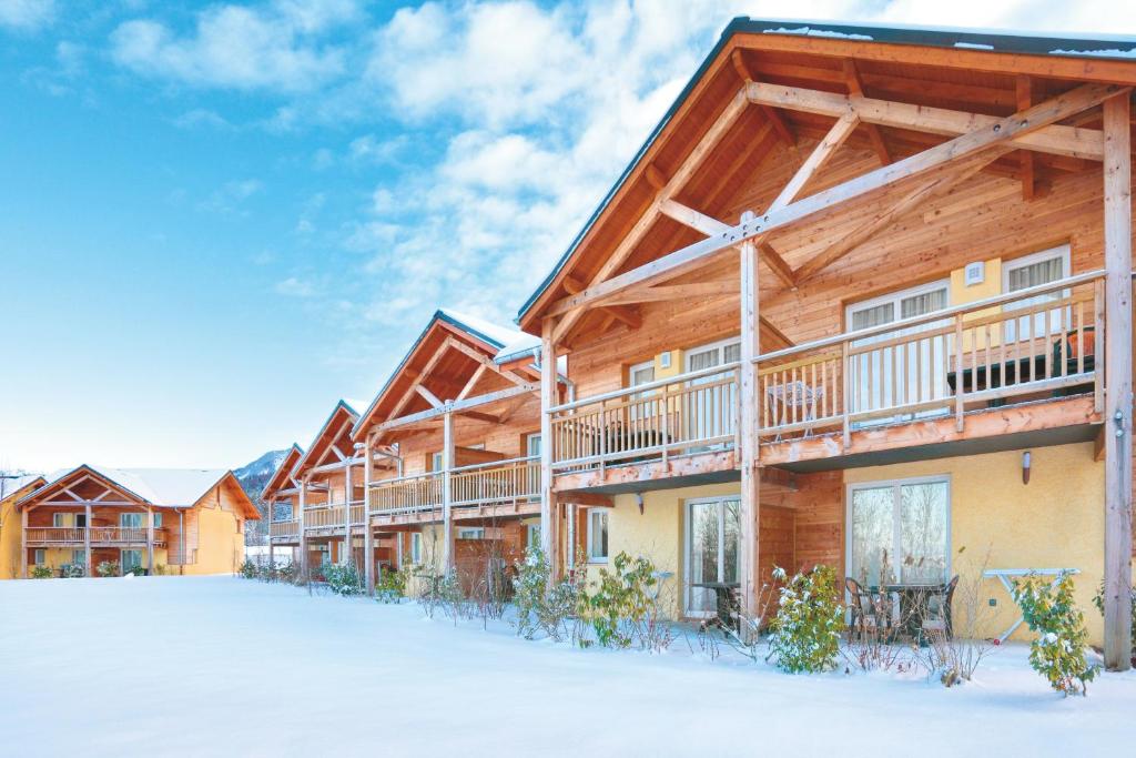 a row of log homes in the snow at Garden & City Evian - Lugrin in Lugrin