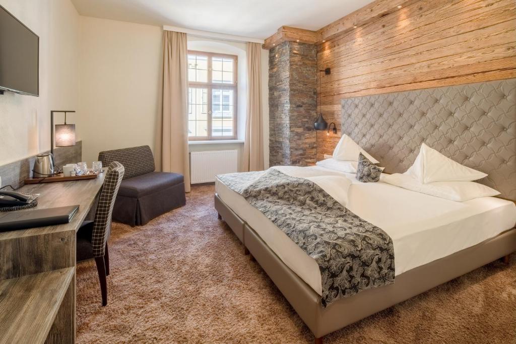 
Cama o camas de una habitación en BEST WESTERN Plus Hotel Goldener Adler Innsbruck
