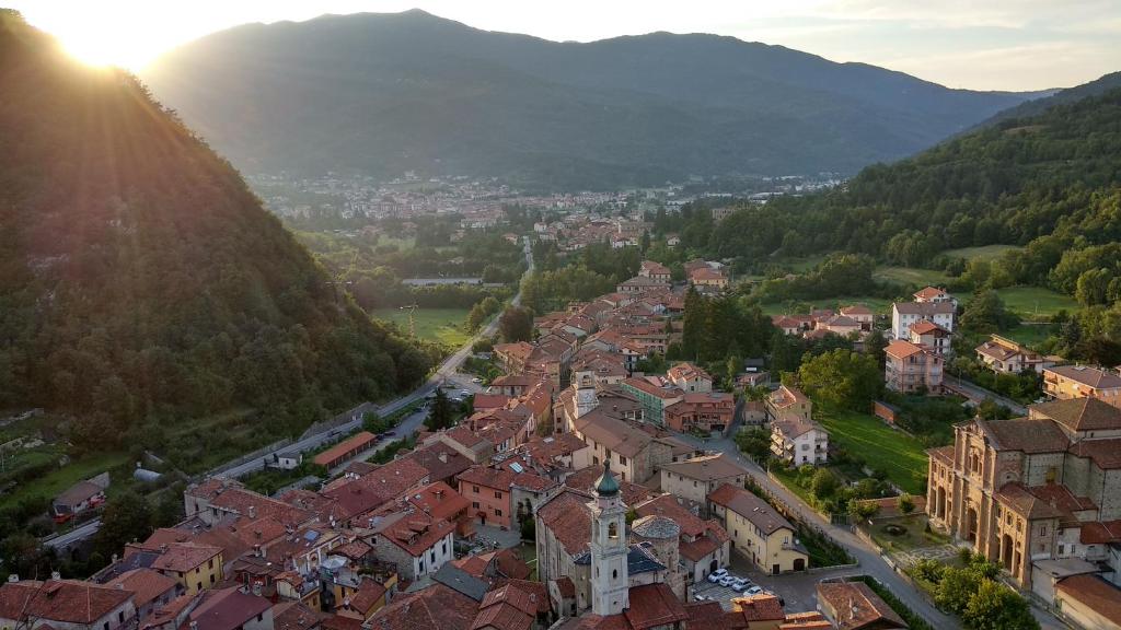 an aerial view of a town in the mountains at Porta Rose in Garessio
