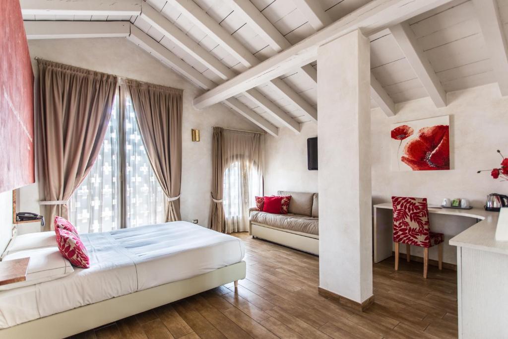 Postel nebo postele na pokoji v ubytování Agriturismo La Camilla