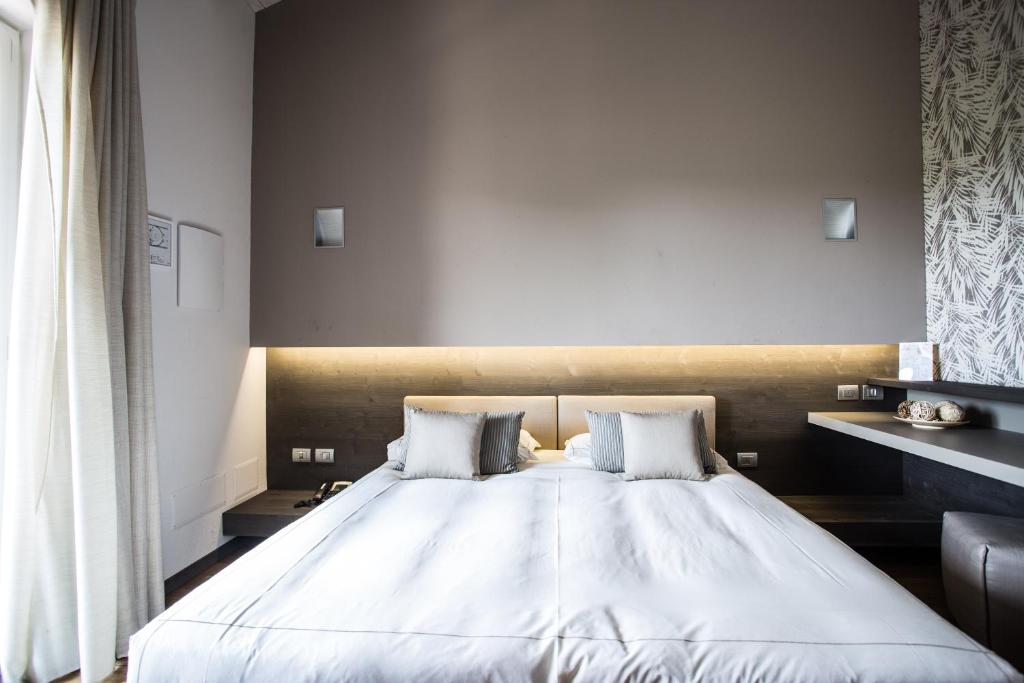 Postel nebo postele na pokoji v ubytování Agriturismo La Camilla