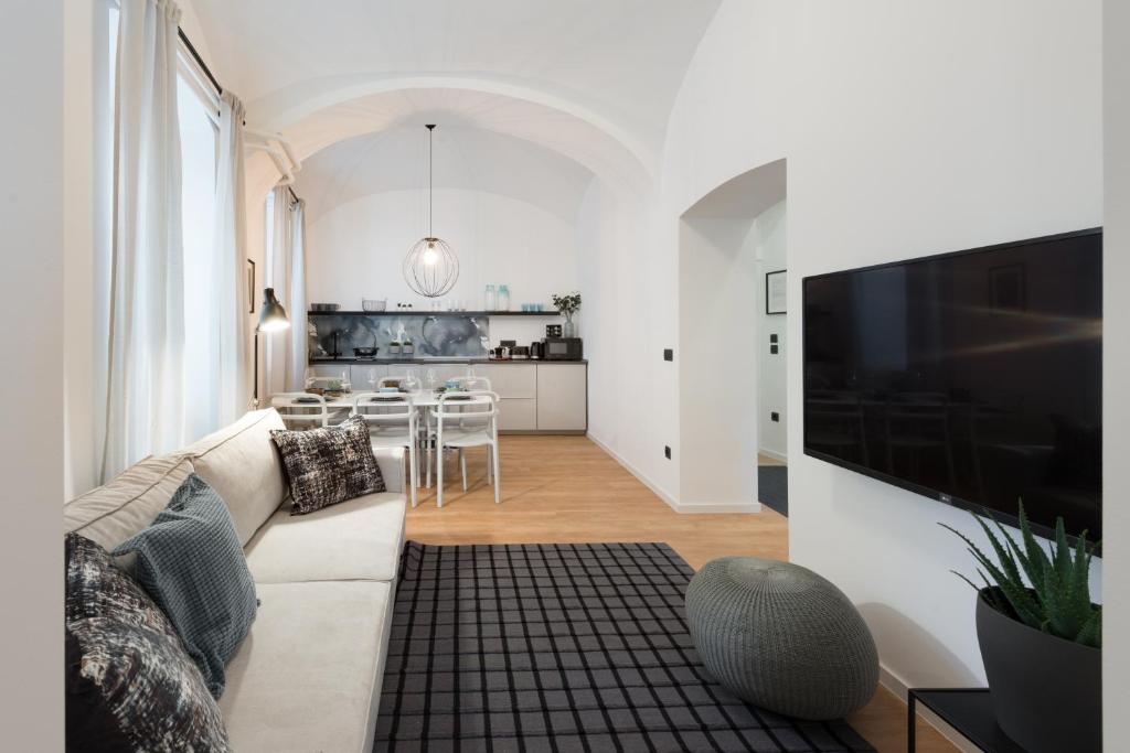 TV a/nebo společenská místnost v ubytování Apartments Rog