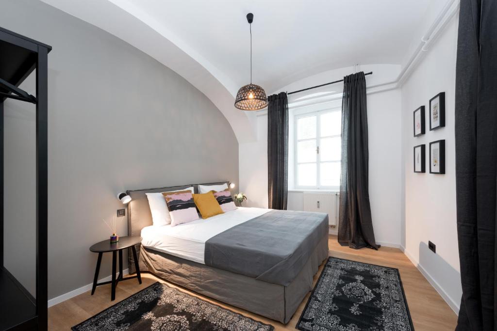 Postel nebo postele na pokoji v ubytování Apartments Rog