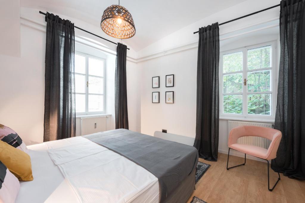 Postel nebo postele na pokoji v ubytování Apartments Rog