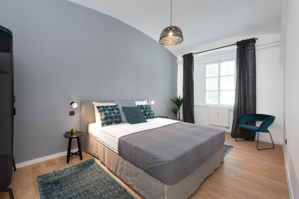 Postel nebo postele na pokoji v ubytování Apartments Rog