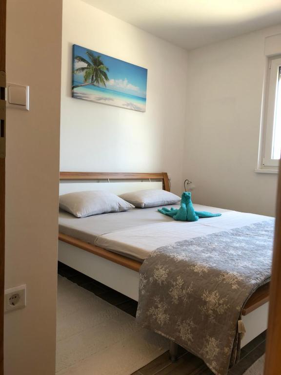 Posteľ alebo postele v izbe v ubytovaní Harmony VIR Luxuriös ausgestattete Ferienwohnung mit 65m2