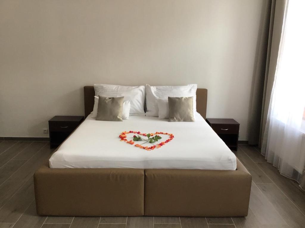 Postel nebo postele na pokoji v ubytování EURO APARTMENTS LIDICKÁ 39 BRNO