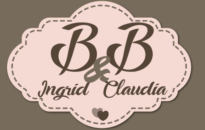 a logo for an indian wedding venue in india at B&B Ingrid e Claudia in Nemoli