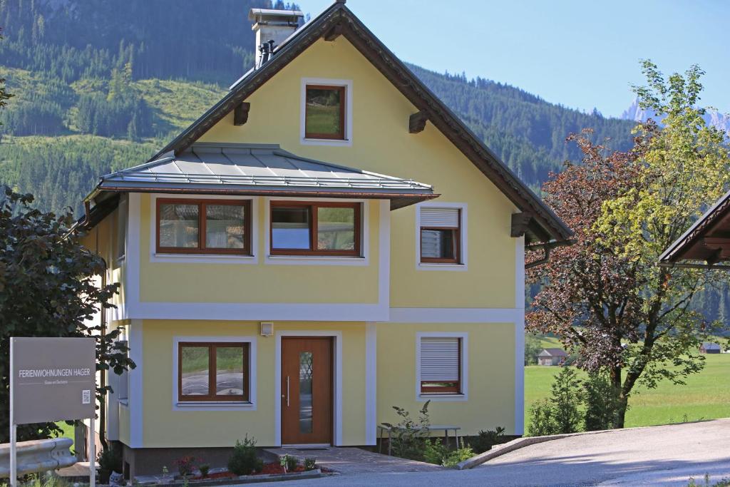 a house with a solar roof on top of it at Ferienwohnungen Hager in Gosau