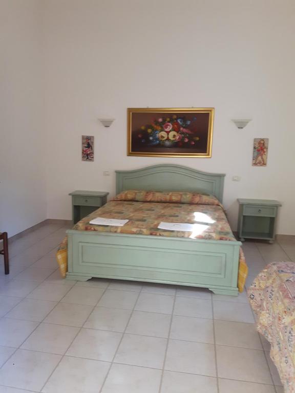 Postel nebo postele na pokoji v ubytování Agriturismo La Selva