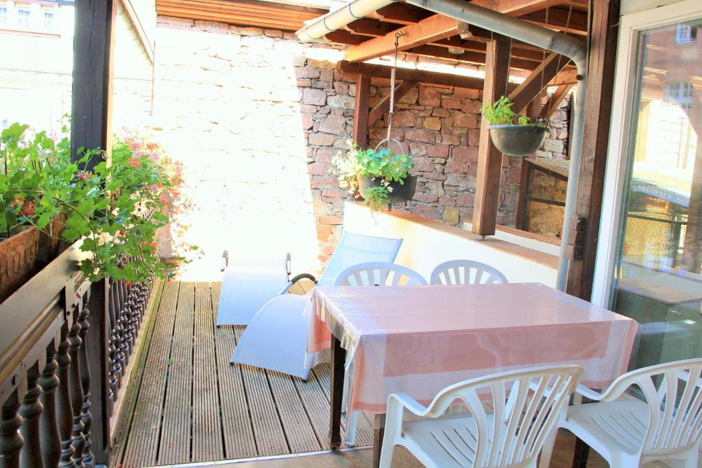 Balkón nebo terasa v ubytování Hostellerie au Cygne