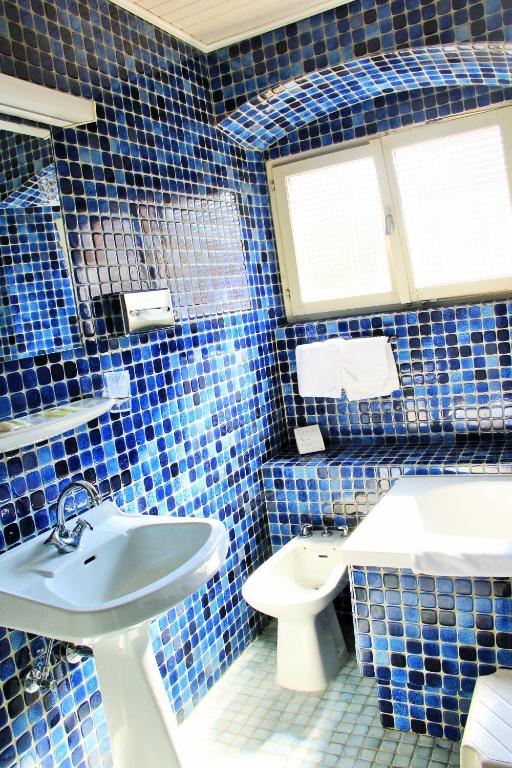 Koupelna v ubytování Hostellerie au Cygne