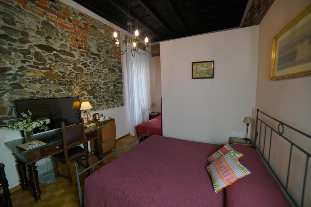 Postel nebo postele na pokoji v ubytování Hotel Sole