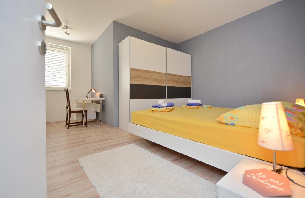 Posteľ alebo postele v izbe v ubytovaní Apartment Pan