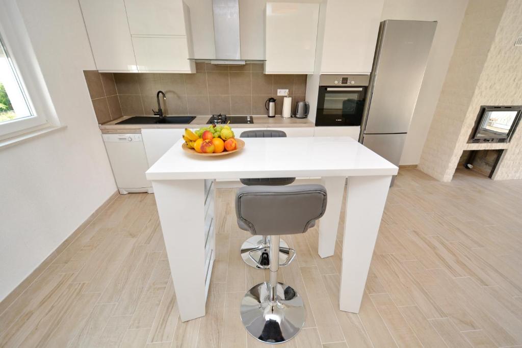 Kuchyňa alebo kuchynka v ubytovaní Apartment Pan