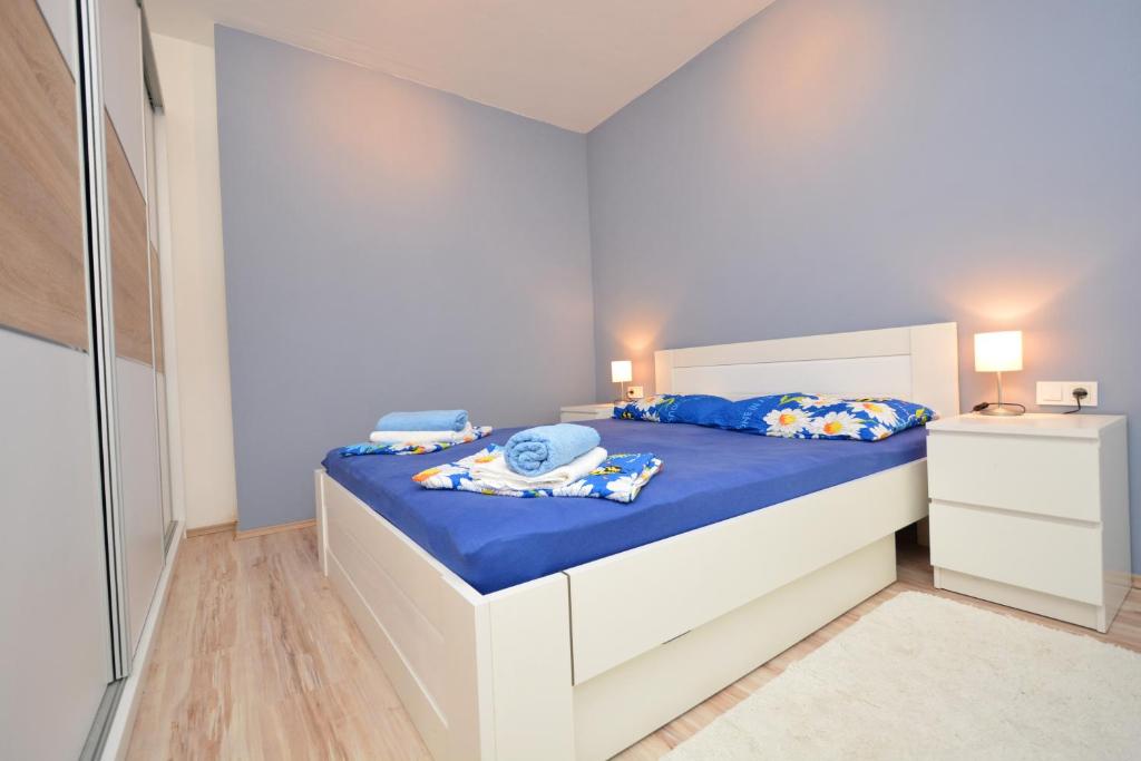 Posteľ alebo postele v izbe v ubytovaní Apartment Pan