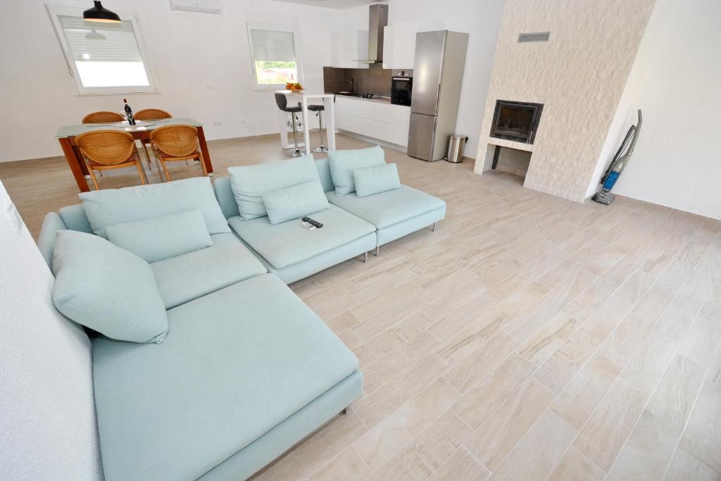 Televízia a/alebo spoločenská miestnosť v ubytovaní Apartment Pan