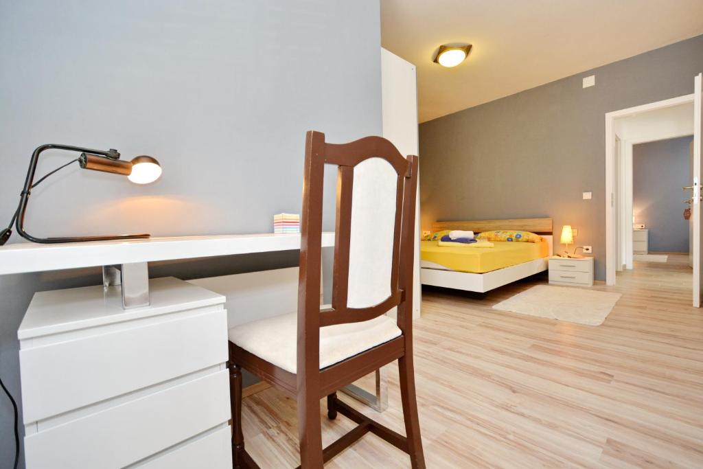 Posteľ alebo postele v izbe v ubytovaní Apartment Pan