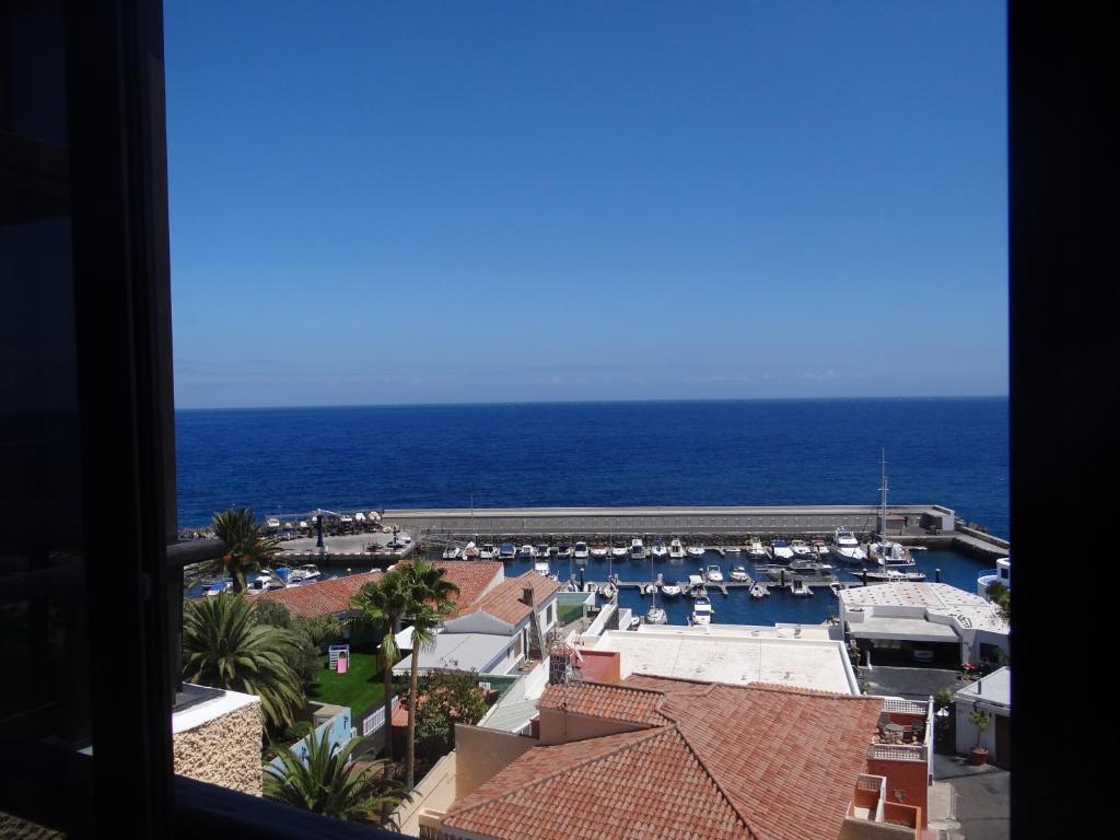 a view of the ocean from a hotel room at Acogedor estudio en Candelaria en primera línea de mar in Candelaria