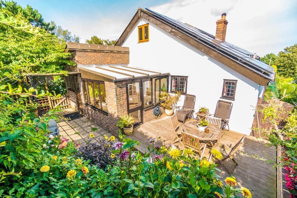 Zahrada ubytování Badgers Den - Covehurst Bay Holiday Cottage