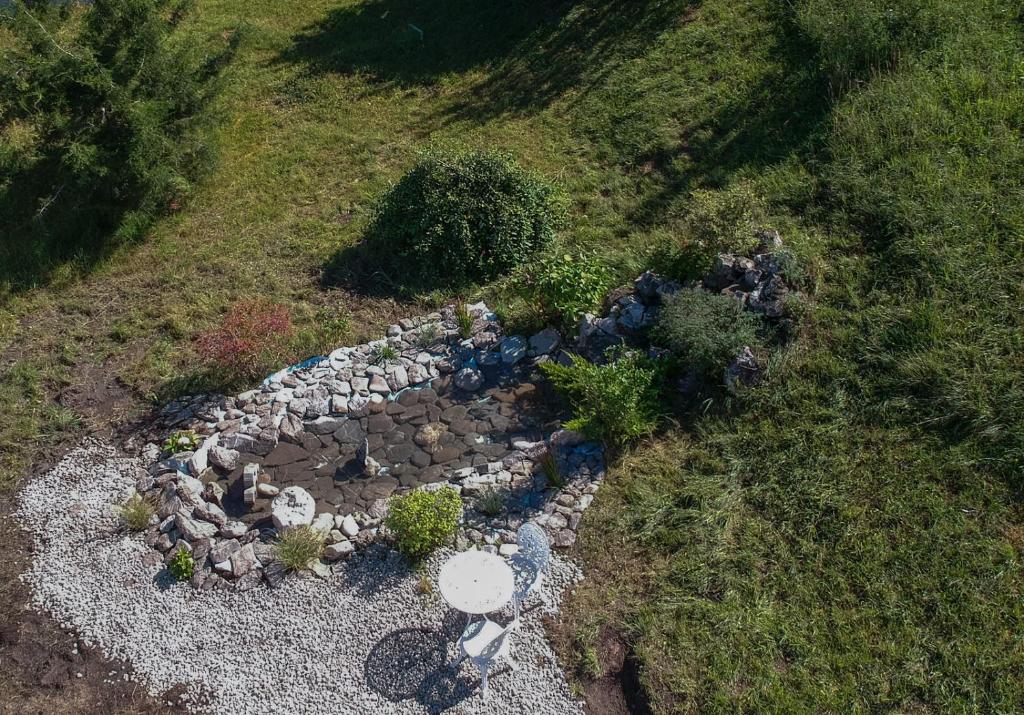 an overhead view of a rock garden in a field at Casa Din Gradina Lui Ioan in Tărlungeni