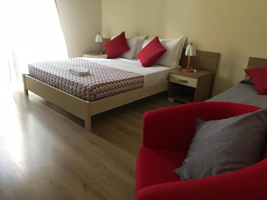 Posteľ alebo postele v izbe v ubytovaní Papali