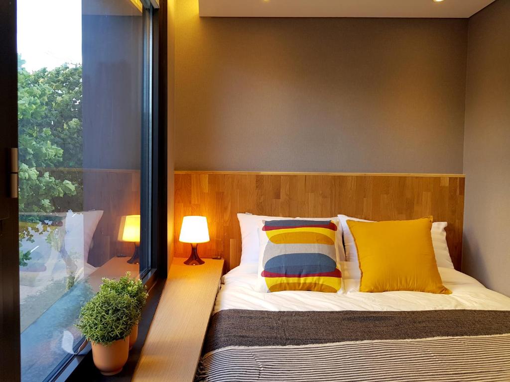 Cama ou camas em um quarto em Hostel CLEO Seoul Hongdae