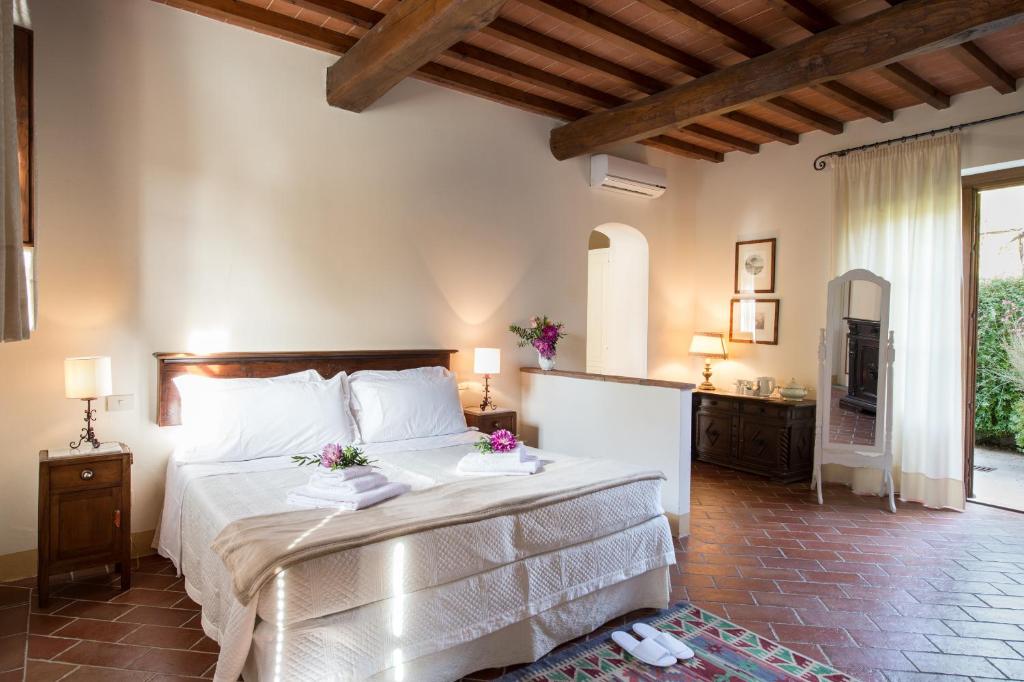 Postel nebo postele na pokoji v ubytování Borgo I Vicelli Adults Only Relais