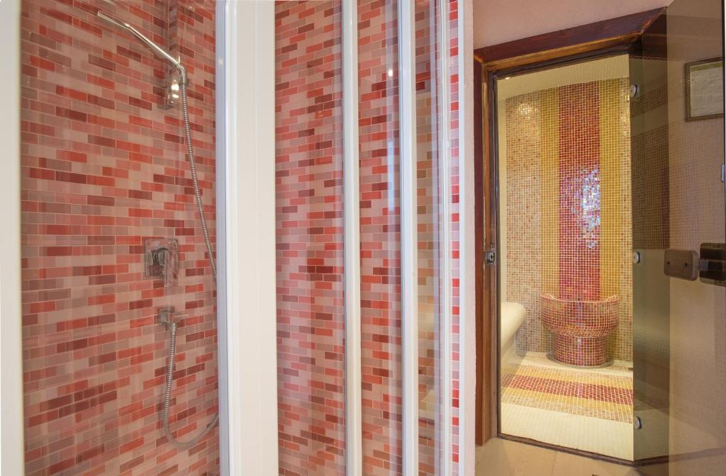 Koupelna v ubytování Boutique Hotel Uniqato