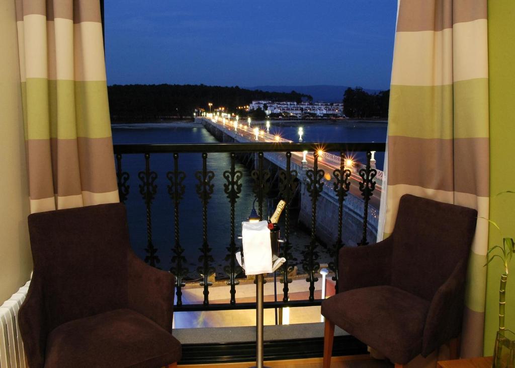 Balkón nebo terasa v ubytování Hotel Puente de La Toja