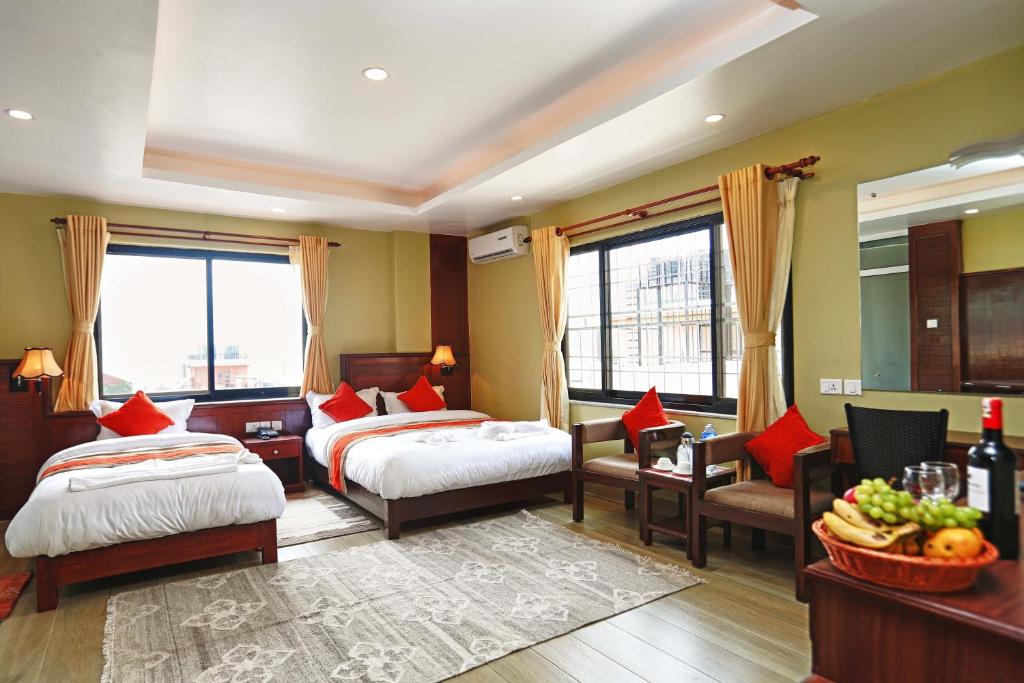 Ένα ή περισσότερα κρεβάτια σε δωμάτιο στο Hotel The Clock