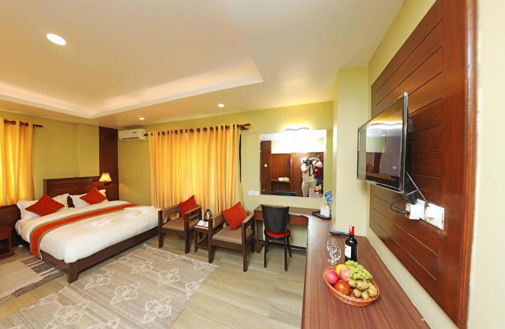 Ένα ή περισσότερα κρεβάτια σε δωμάτιο στο Hotel The Clock