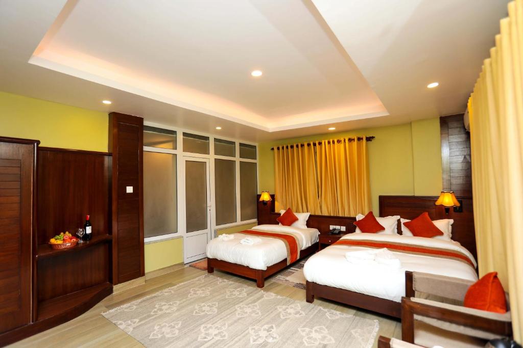 Ένα ή περισσότερα κρεβάτια σε δωμάτιο στο Hotel The Clock